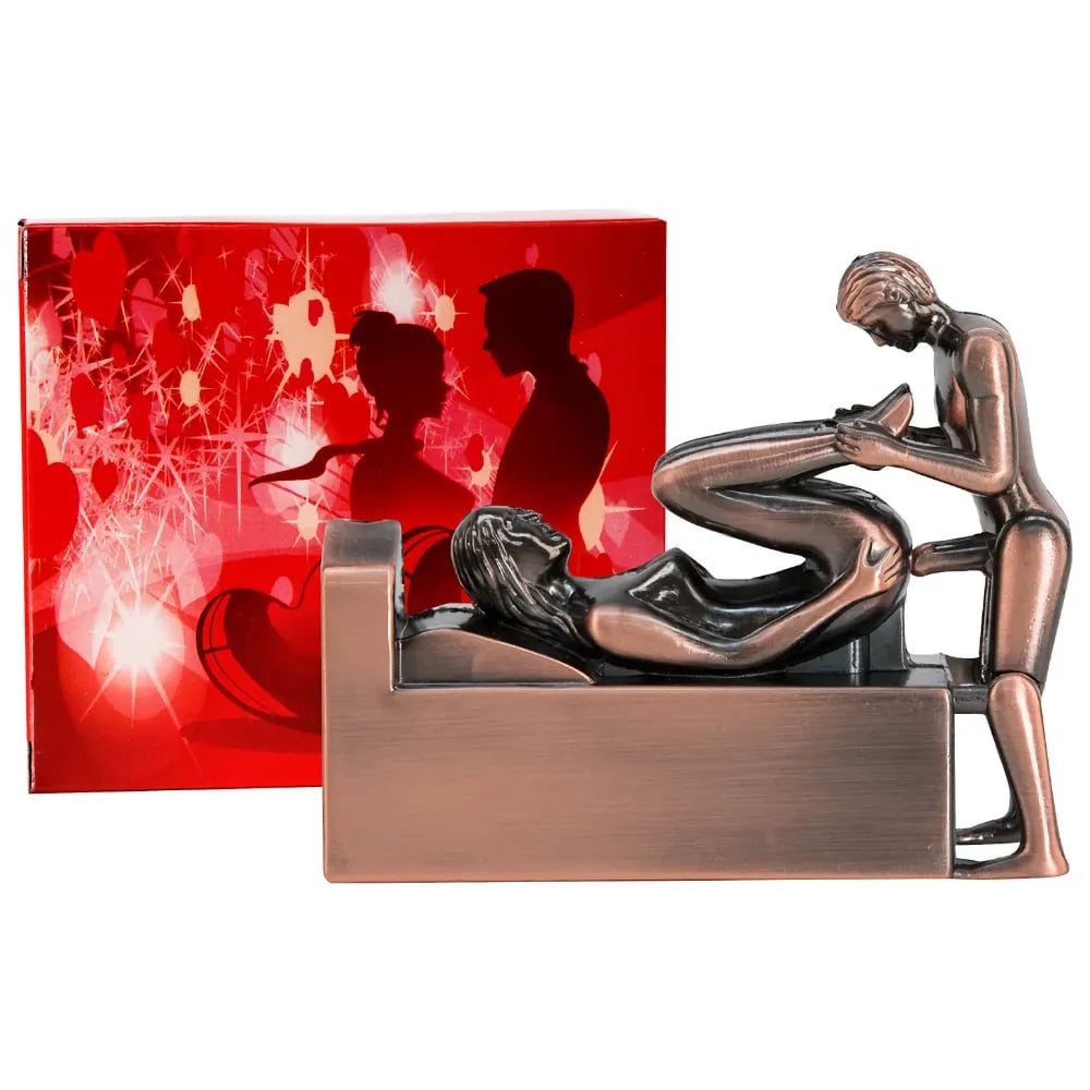 couple on bed cigar torch